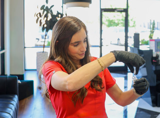Whitney Langford preparing for a provider-led Tox treatment appointment